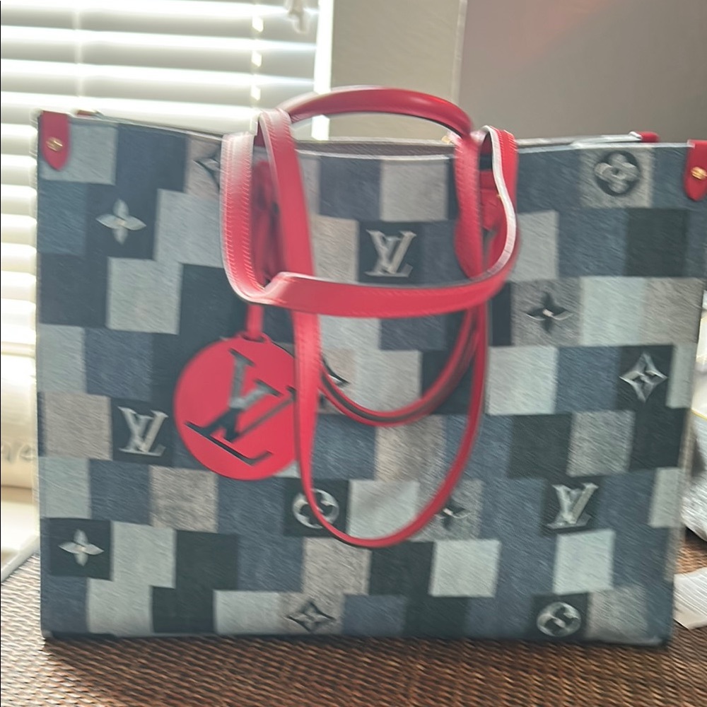 Louis Vuitton Red and denim large bag like new only carried a couple of time